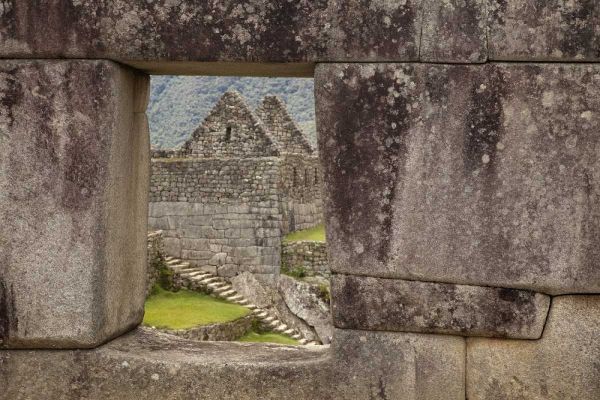 Peru, Machu PicchuHouse framed by a stone window